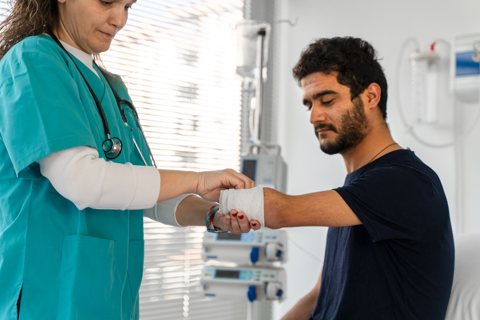 Doctor Wrapping Bandage On  Arm amputation